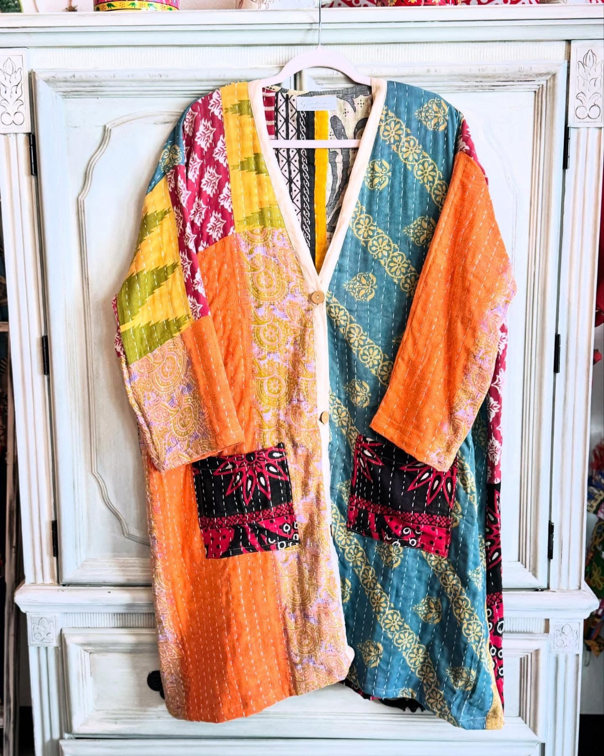 Reversible Kantha Kimono front side in multiple colors with black pockets and hand stitched kantha details