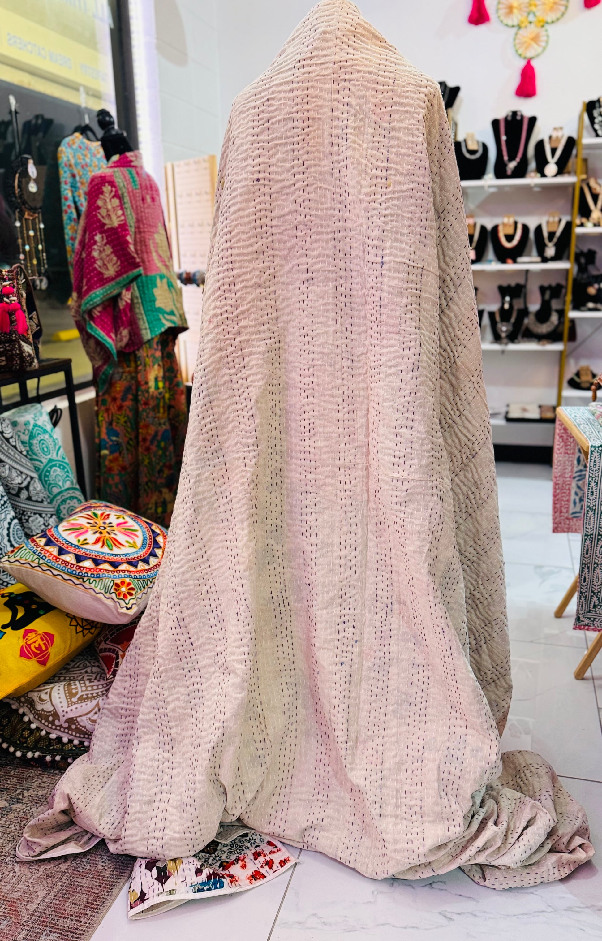 100% cotton in solid half-white with exposed intricate kantha stitches