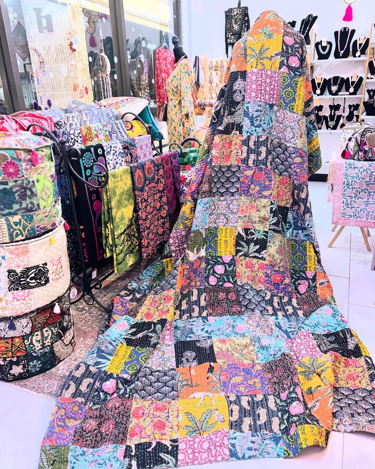 Handmade cotton kantha quilt made with over 180 patches