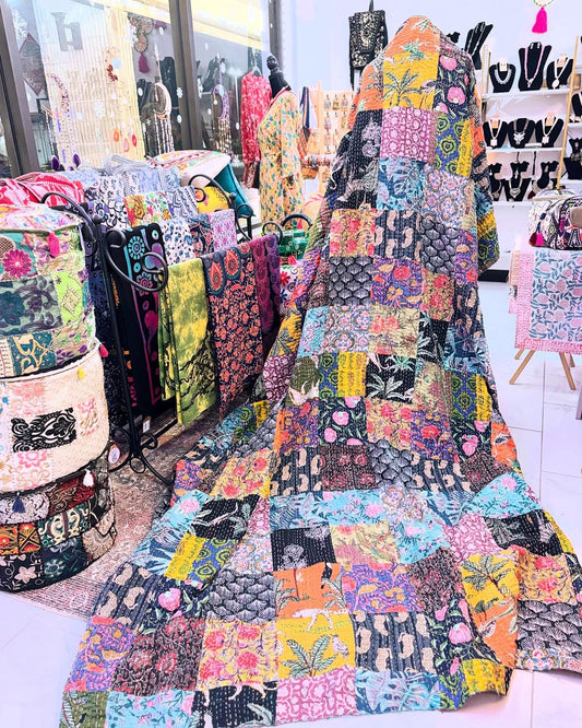 Handmade cotton kantha quilt made with over 180 patches