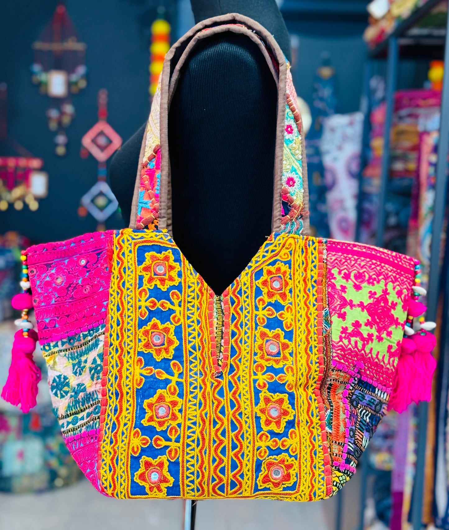 Handmade tribal tote bag backside with yellow, blue and pink embroidery patches and mirrors