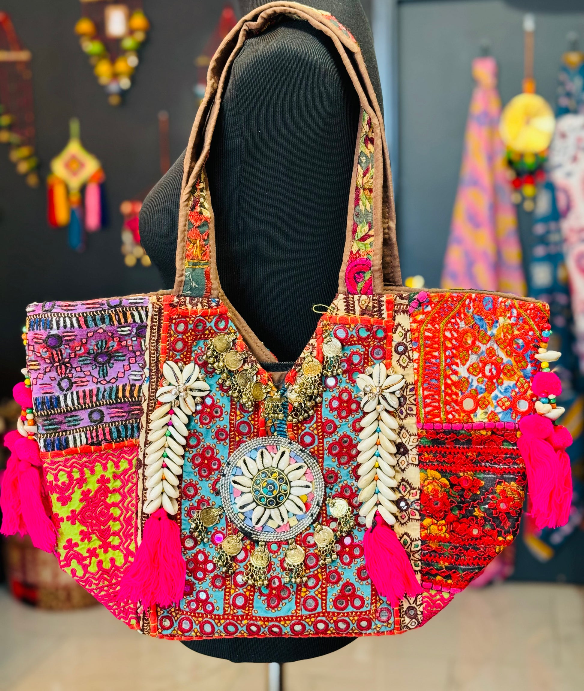 Calm Blue handmade banjara tribal Indian tote bag with multi color embroidered patches, mirror work, cowrie shells, hot pink tassels.