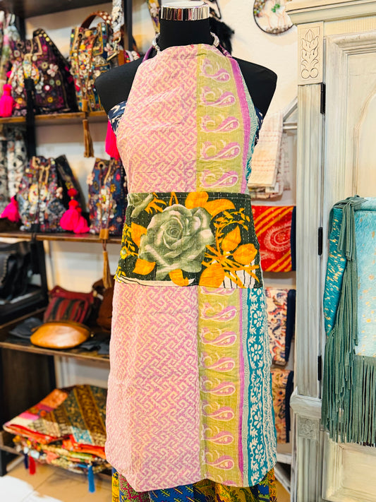Big Rose on the 3 pockets with subtle pink and paisleys on one side of the reversible kantha apron. Made with 100% cotton sarees.