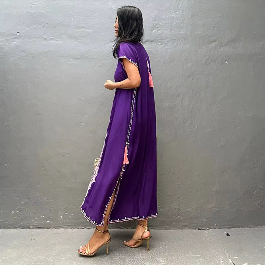 Side look of the purple lace tassels kaftan dress with slits