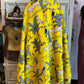 Close up look of jungle kantha printed on yellow cotton fabric- showcasing thousands of kantha stitches