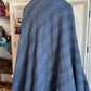 Showcasing tiny kantha stitches on the back of silk patchwork kantha quilt made of 160 patches