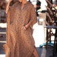 Leopard print kaftan with buttons and pockets and side slits