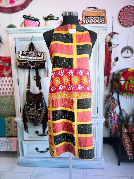 One side of Sunset Grid Kantha apron with black, red and yellow squares