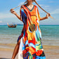 This kaftan has a guitar printed with a jewel v neck and side slits 
