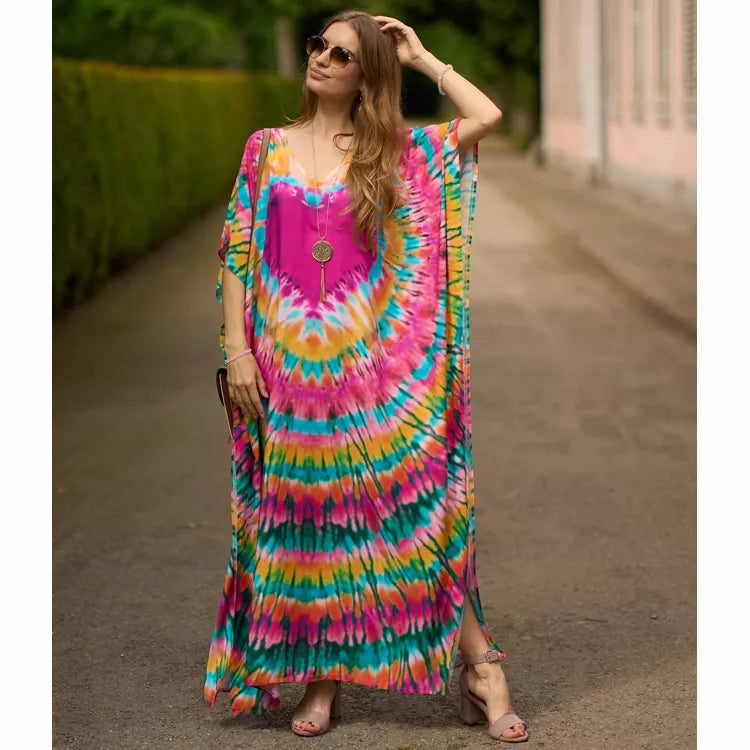 showcasing the sleeve of the tiedye printed Heart Kaftan dress