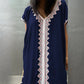 Navy blue kaftan dress with intricate white and pink Lace work in the front