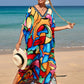 Lips Kaftan has side slits with vibrant print
