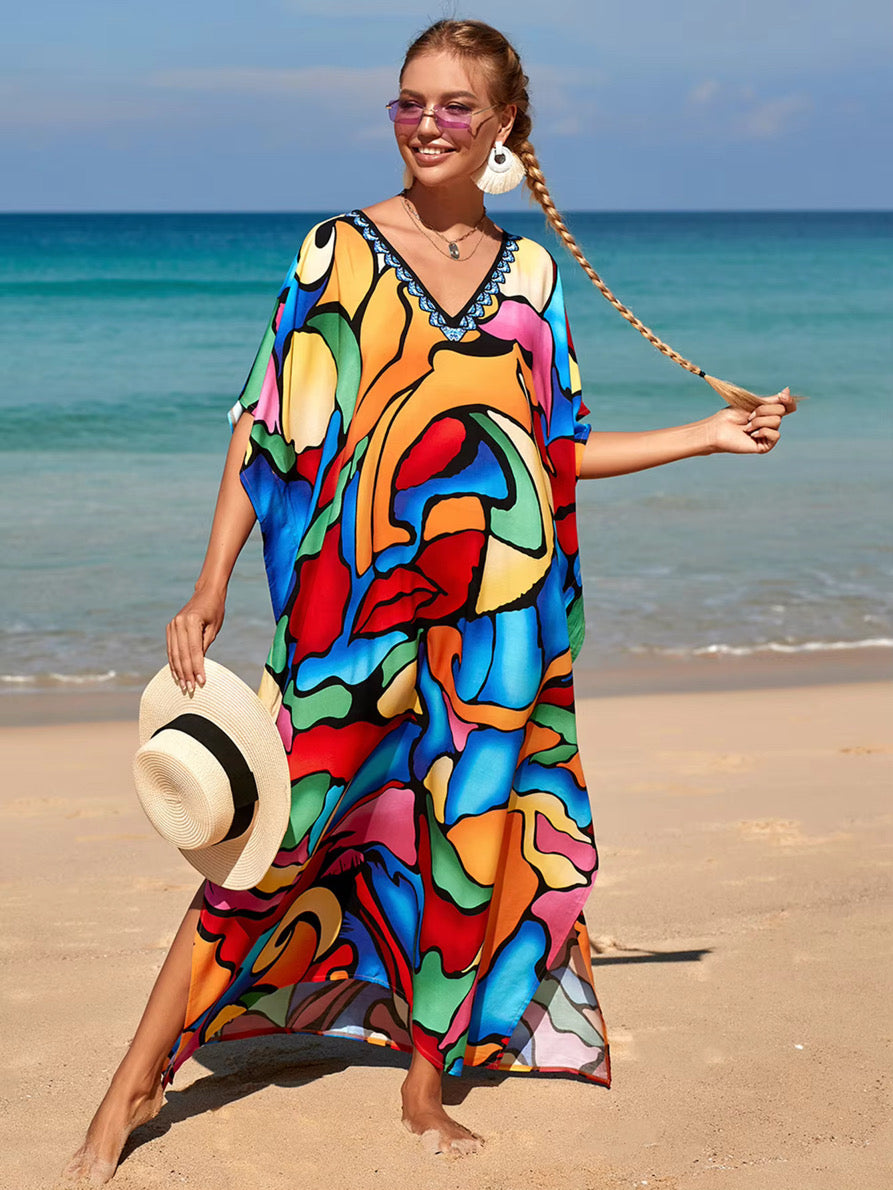 Lips Kaftan has side slits with vibrant print