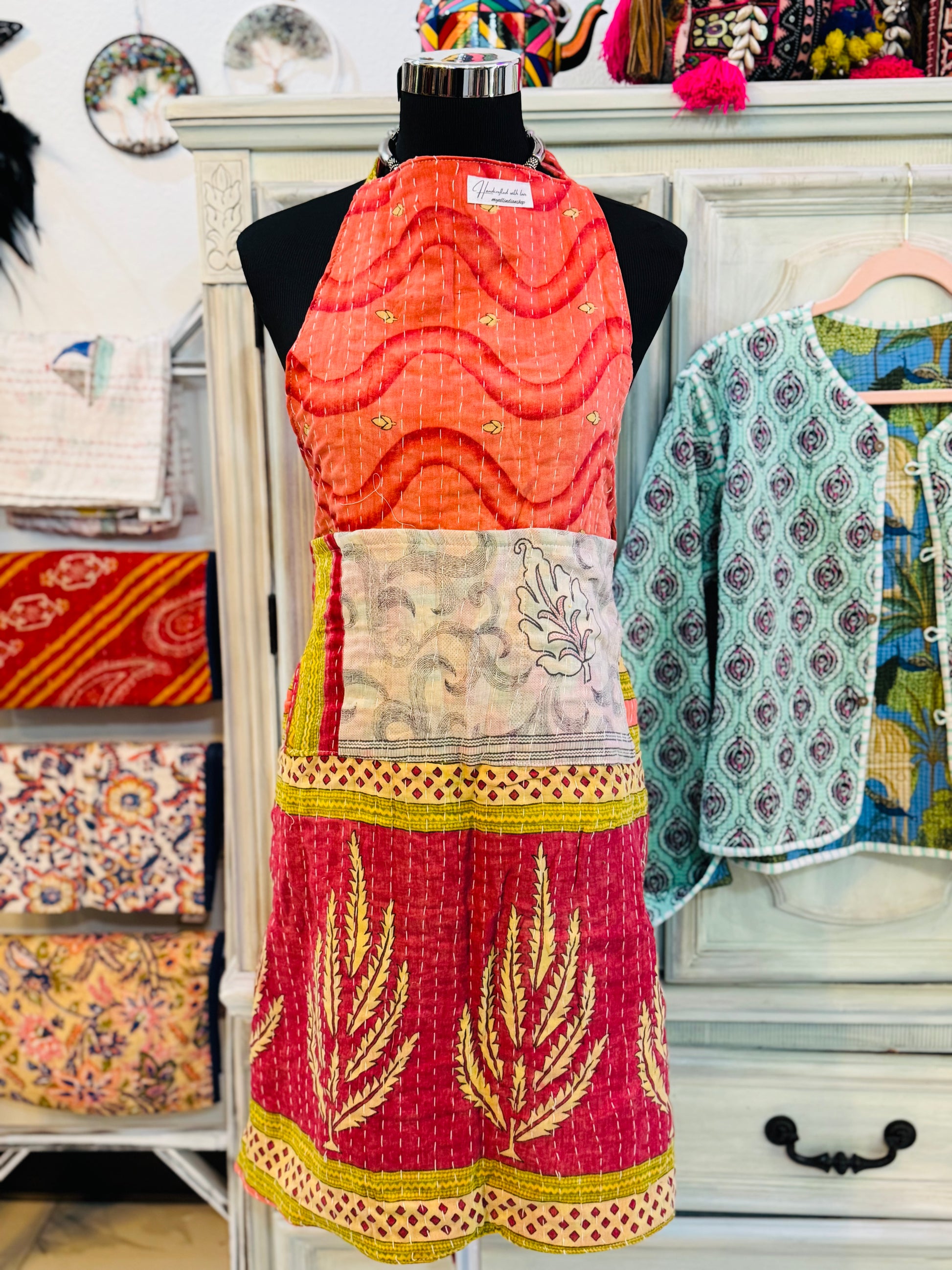 Other side of white leaf kantha apron showcasing multicolor cotton saree patches