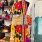 Bold flowers with vibrant colors on one side of the reversible apron; make with 100% cotton.
