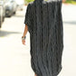 Backside of the black stripes buttons and pockets kaftan