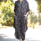 Black and white stripes print of the pockets and buttons kaftan