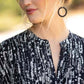 Elegant Neck line of the buttons and pockets kaftan in black and white stripes 