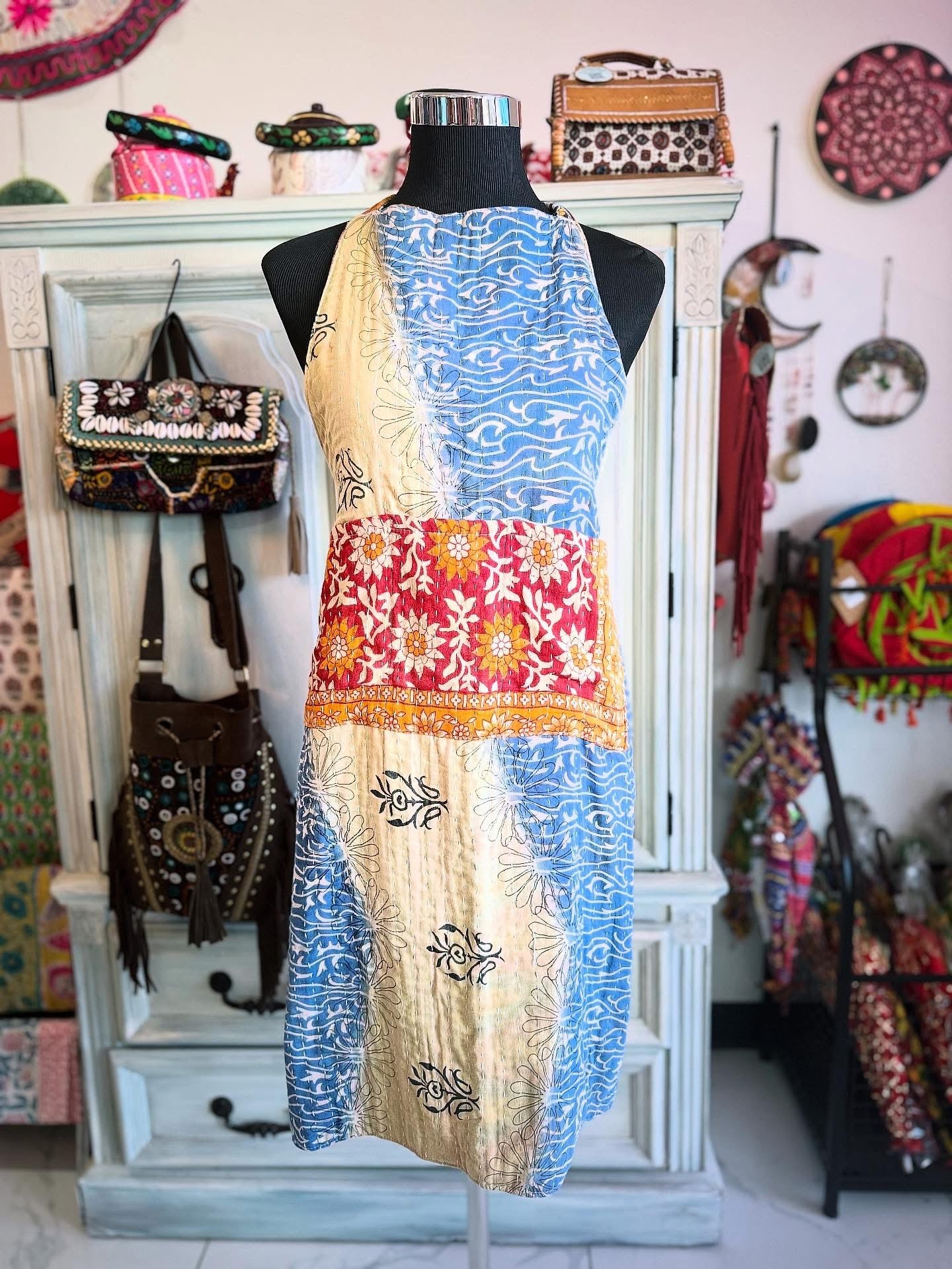 Other side of Ocean Bloom kantha apron featuring blue and cream swirling print